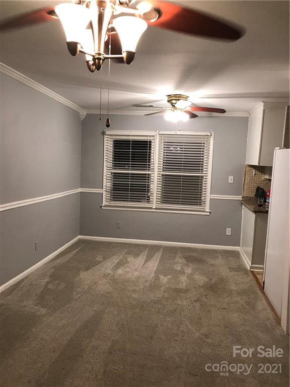 10441 Rockwood Road Charlotte, NC 28215 - Photo 41 of 45 a view of an empty room with a window