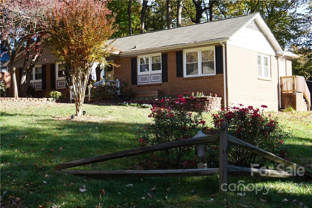 10441 Rockwood Road Charlotte, NC 28215 - Photo 7 of 45 a house view with a garden space