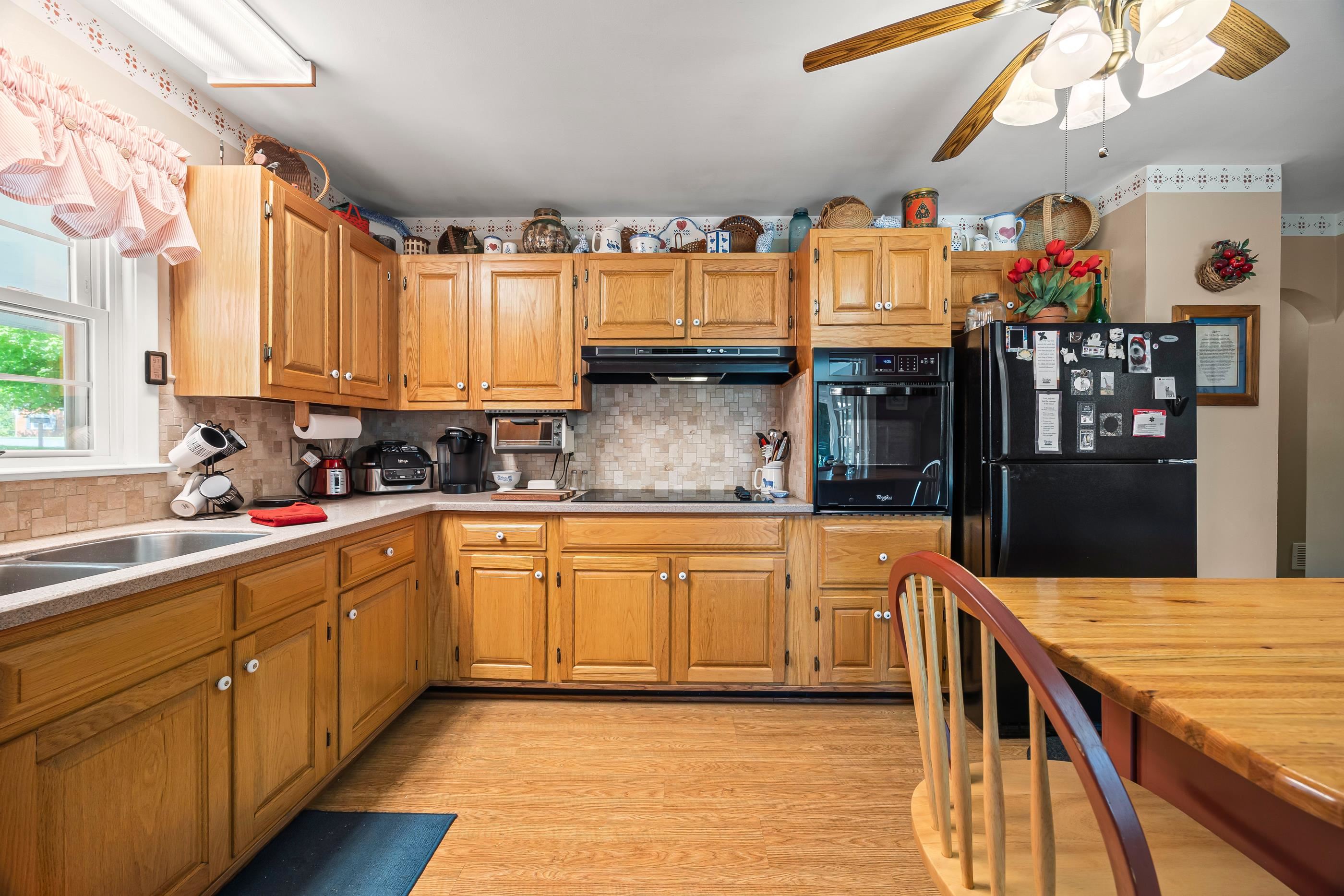 208 Tuxedo Road Staunton, VA 24401 - Photo 17 of 46 a kitchen with granite countertop lots of counter top space and wooden floor
