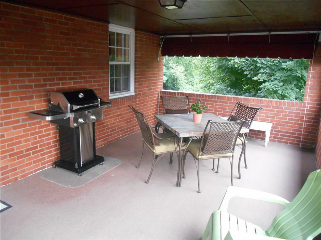 2068 Rockfield Road Pittsburgh, PA 15243 - Photo 11 of 25 The covered side porch has a beautiful wooden ceiling.
