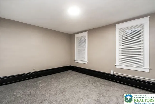 an empty room with closet