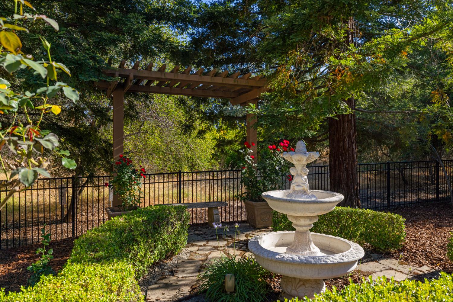 5869 Granite Hills Drive South Granite Bay, CA 95746 - Photo 59 of 66 a view of a chairs and table in backyard