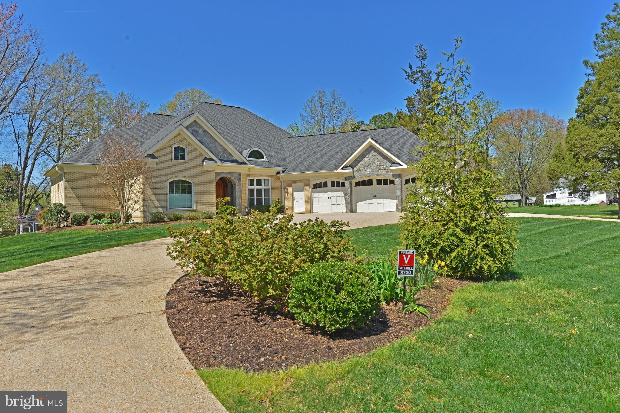 8720 Standish Road Alexandria, VA 22308 - Photo 30 of 30 3-car garage and manicured front lawn