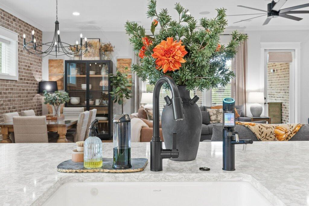 34 Caymus Cove Freeport, FL 32439 - Photo 16 of 42 a vase of flowers sitting on a table