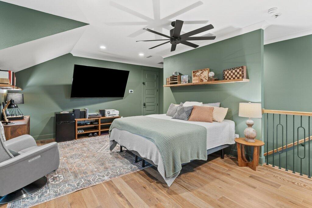 34 Caymus Cove Freeport, FL 32439 - Photo 31 of 42 a bedroom with a bed and a flat screen tv