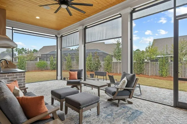 a outdoor space with patio the couches and a dining table with garden view