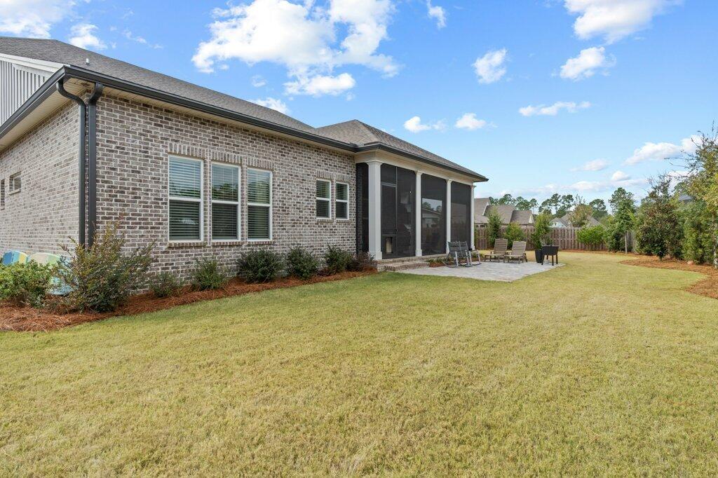 34 Caymus Cove Freeport, FL 32439 - Photo 41 of 42 a front view of house with yard