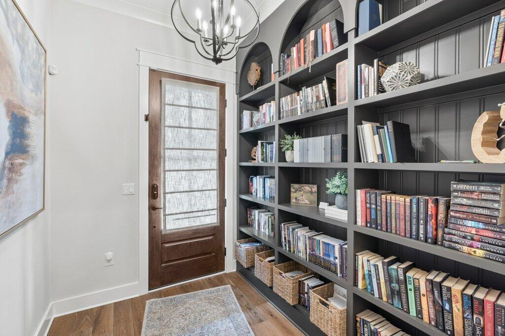 34 Caymus Cove Freeport, FL 32439 - Photo 6 of 42 a view of room with furniture and a book shelf