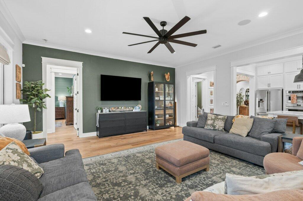 34 Caymus Cove Freeport, FL 32439 - Photo 8 of 42 a living room with furniture and a flat screen tv