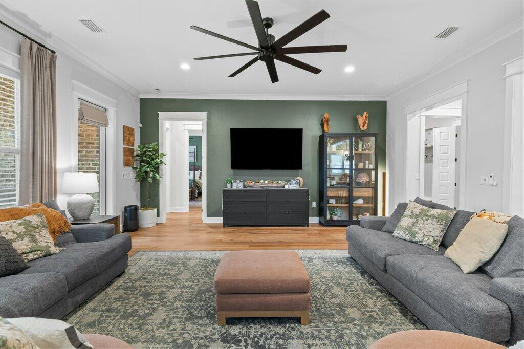 34 Caymus Cove Freeport, FL 32439 - Photo 9 of 42 a living room with furniture and a flat screen tv