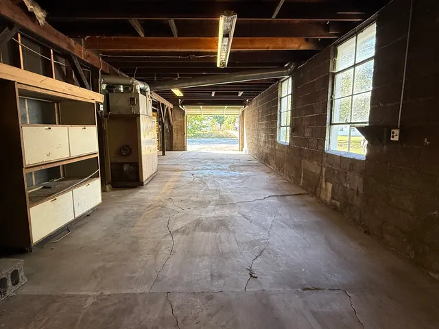 a view of empty room with windows