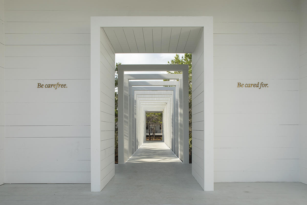 45 West Solaire Way Inlet Beach, Unit PH 2 Inlet Beach, FL 32461 - Photo 11 of 12 a view of a hallway with wooden shelves