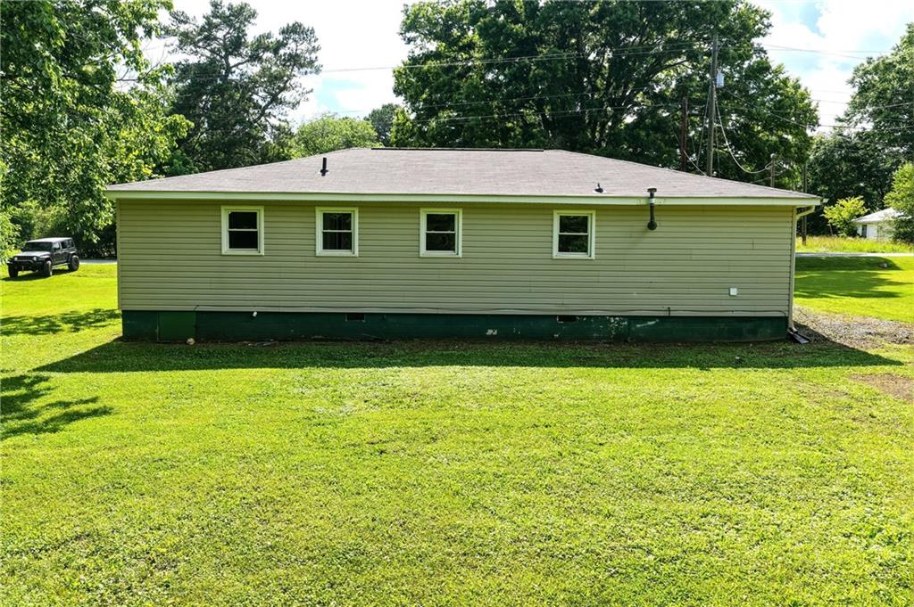 300 Cash Town Road Aragon, GA 30104 - Photo 25 of 28 a front view of a house with a yard