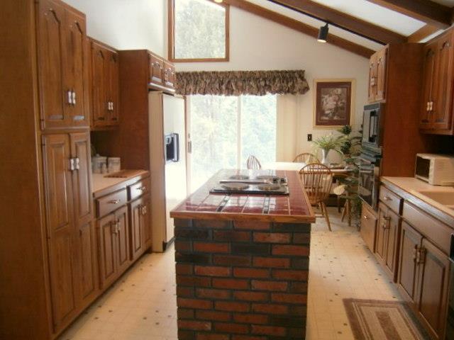 128 East Benton Road Waterville, ME 04901 - Photo 10 of 22 Kitchen looking down to the dining area
