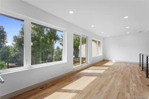 a view of a room with a large window