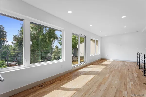 a view of a room with a large window