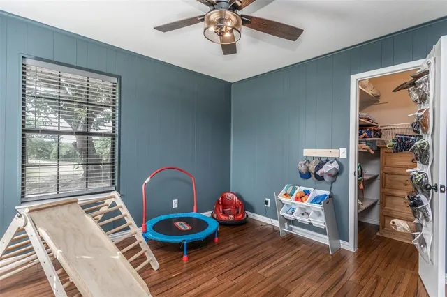 a room with furniture and wooden floor