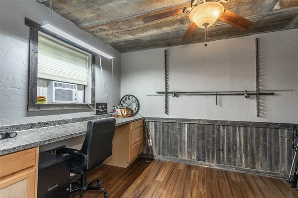 a kitchen with sink cabinets and window