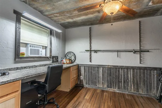 a kitchen with sink cabinets and window