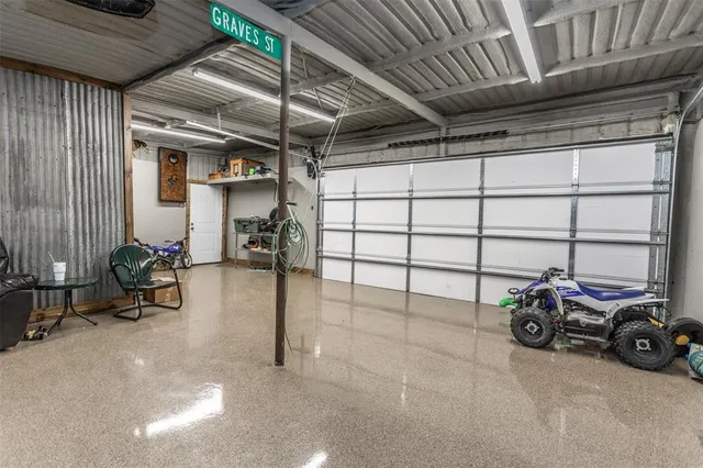 a view of a garage with parked cars