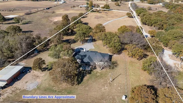 a view of outdoor space with trees all around