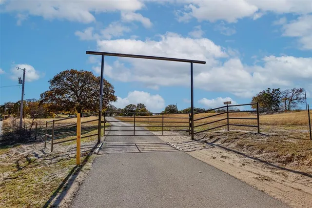 a view of a terrace with wooden fence