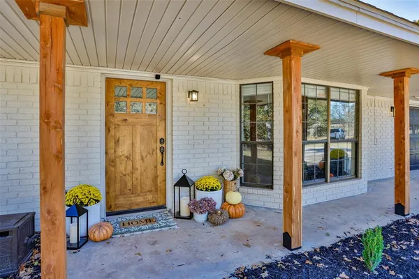 a front view of a house with patio