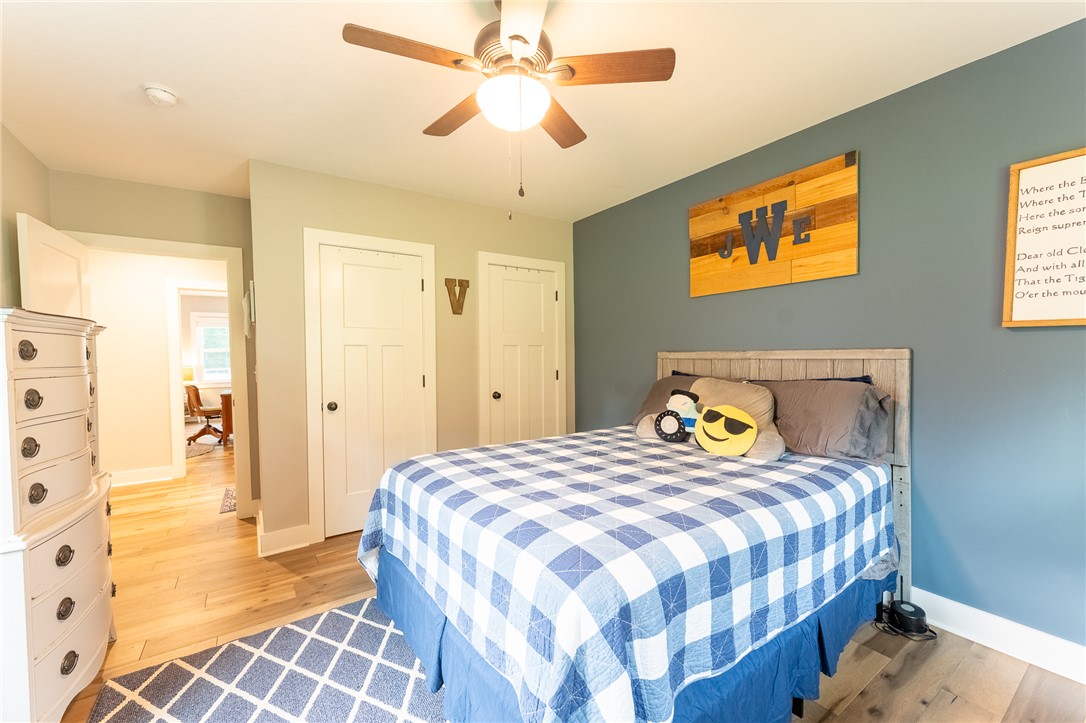 103 Riggs Drive Clemson, SC 29631 - Photo 29 of 50 A comforting bedroom with a classic ceiling fan, providing a tranquil personal haven.
