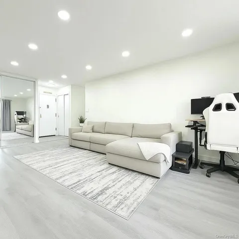 a living room with furniture and a couch