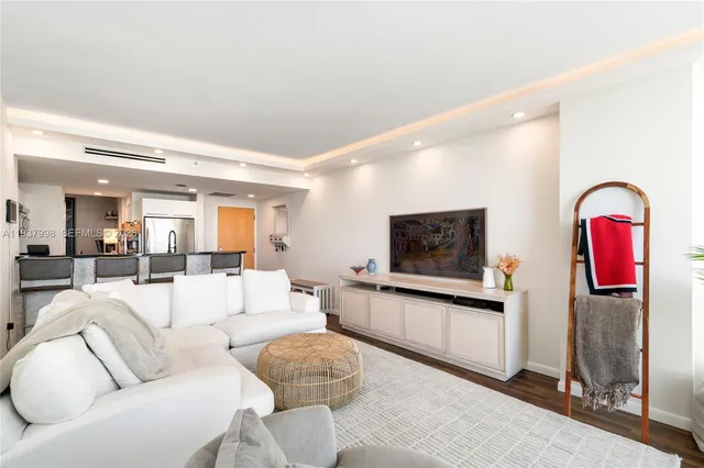 a bedroom with a bed and a lamp