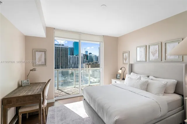 a bathroom with a toilet shower and a bath tub