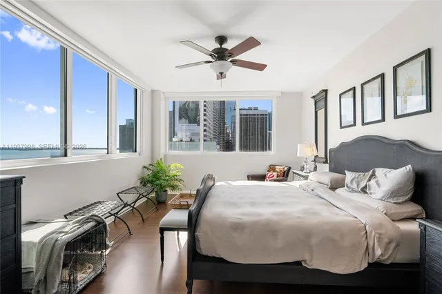 a white bath tub sitting next to a window