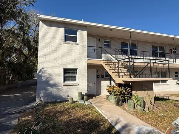 a front view of a house with patio