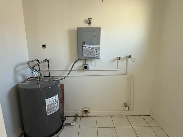 a bathroom with a sink toilet and mirror