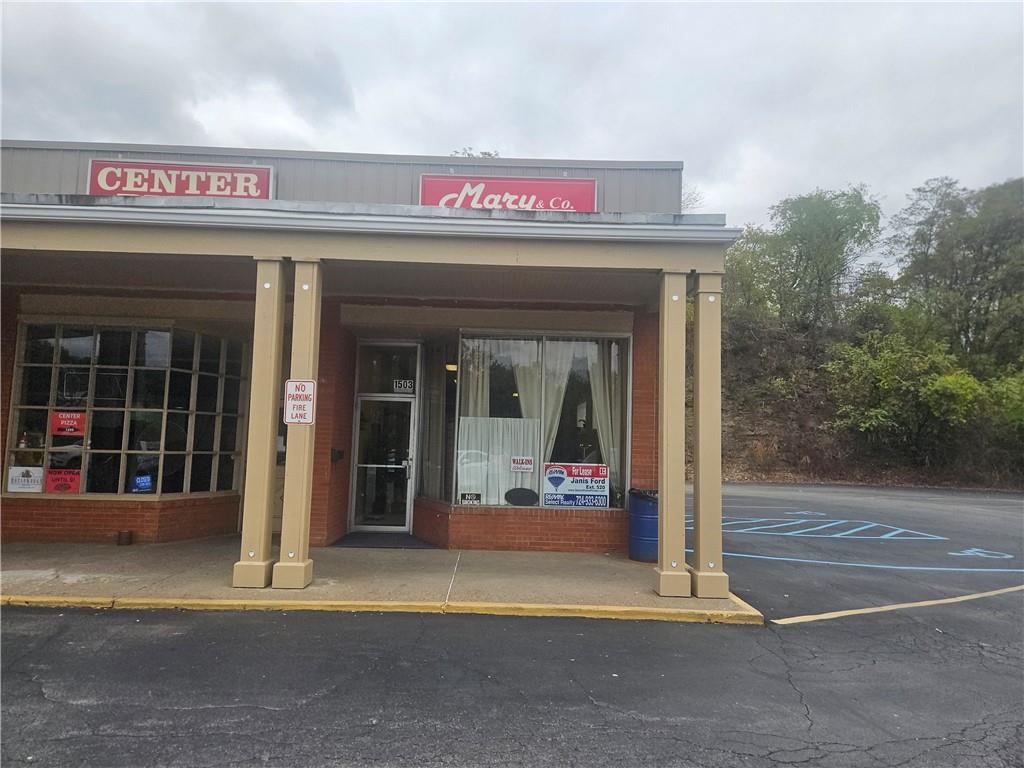 1503 Old Brodhead Road Monaca, PA 15061 - Photo 2 of 12 a view of a entrance door of the building