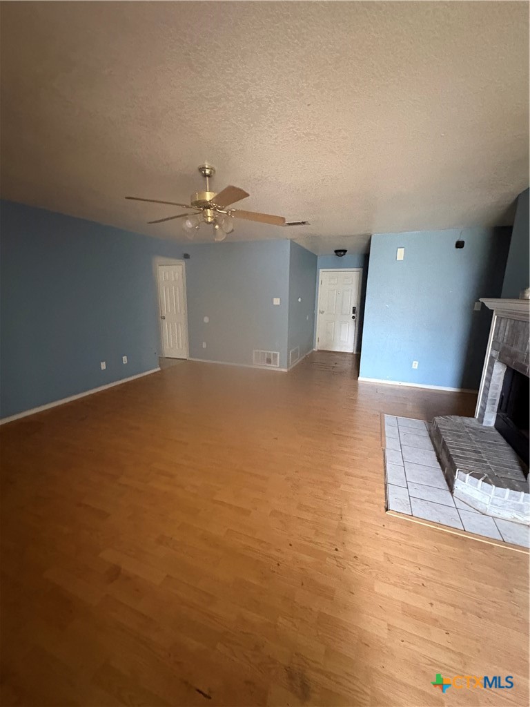 206 Timber Ridge Drive Nolanville, TX 76559 - Photo 5 of 21 a view of a livingroom with furniture and a ceiling fan