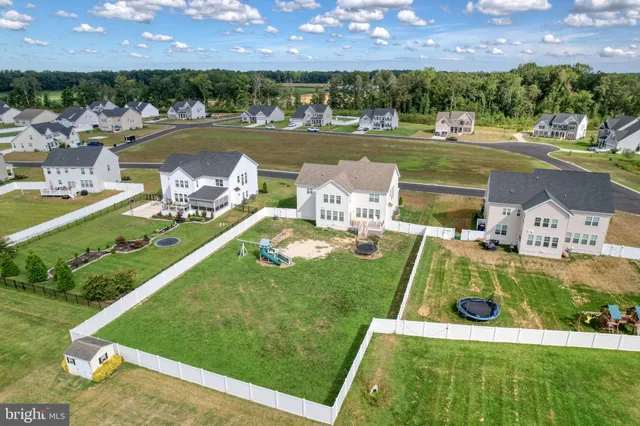 a view of a lake with a house
