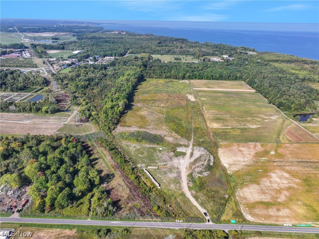 3320 Perry Park Road Perry, OH 44081 - Photo 2 of 5 Expansive undeveloped land featuring diverse terrain including wooded areas and open fields