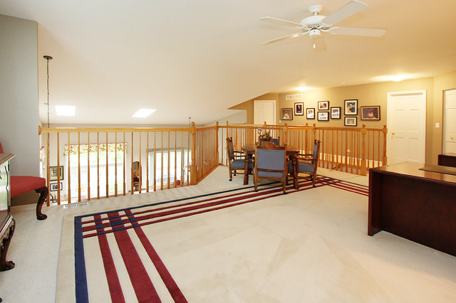 1760 Park Ridge Point, Unit 1760 Park Ridge, IL 60068 - Photo 12 of 15 an empty room with wooden floor and windows