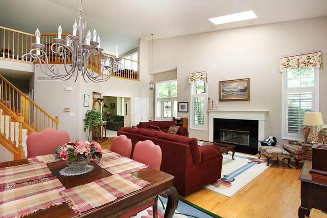 1760 Park Ridge Point, Unit 1760 Park Ridge, IL 60068 - Photo 3 of 15 a living room with furniture fireplace and a large window
