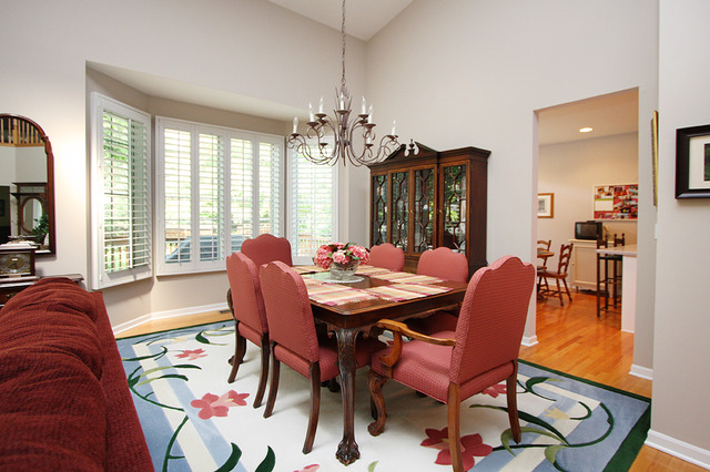 1760 Park Ridge Point, Unit 1760 Park Ridge, IL 60068 - Photo 5 of 15 a view of a dining room with furniture window and wooden floor