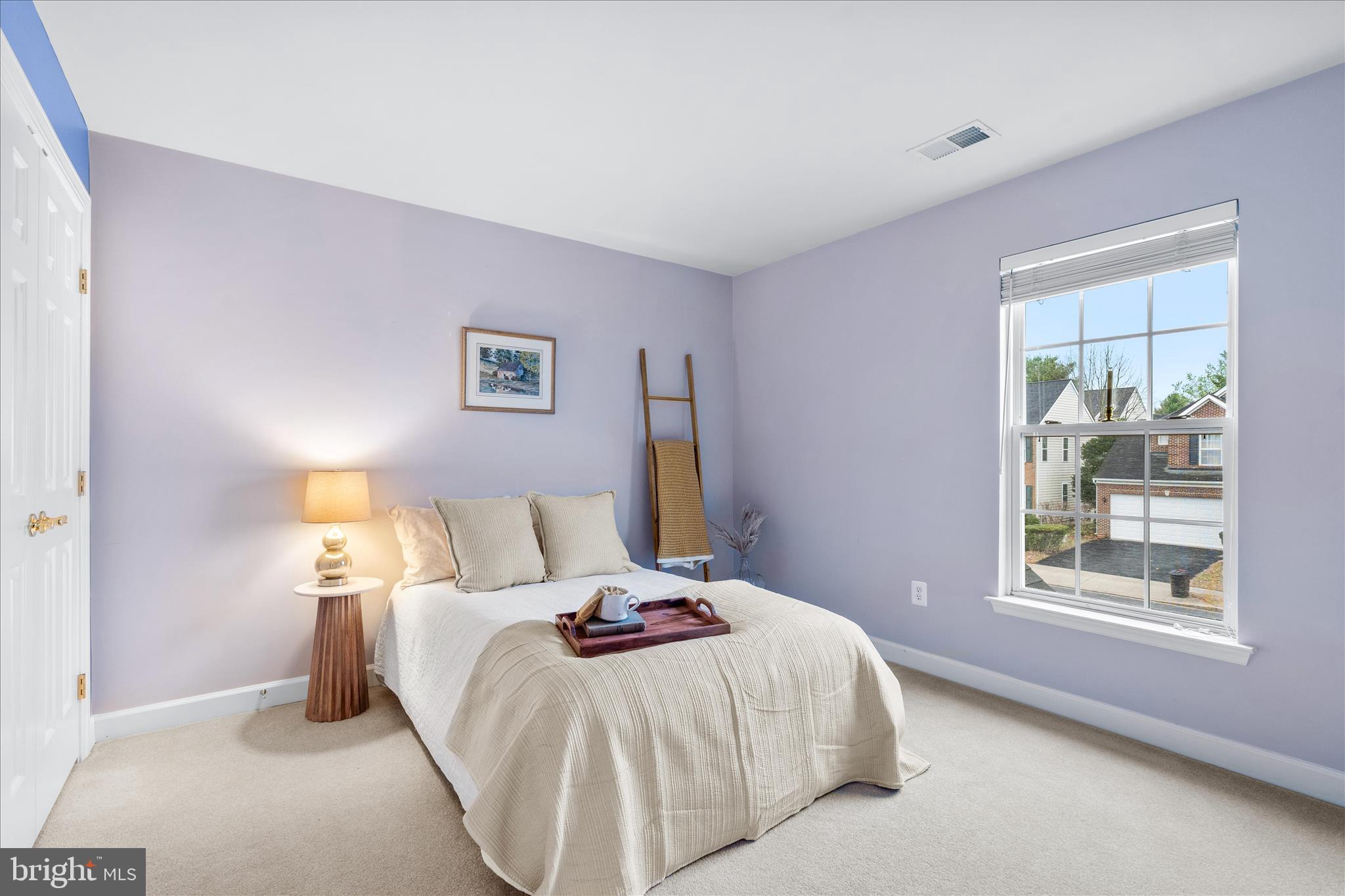 9054 Seward Street Frederick, MD 21704 - Photo 26 of 41 a bedroom with a bed and a window