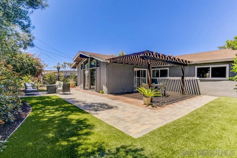 4925 Rebel Road San Diego, CA 92117 - Photo 1 of 25 a view of a house with a patio