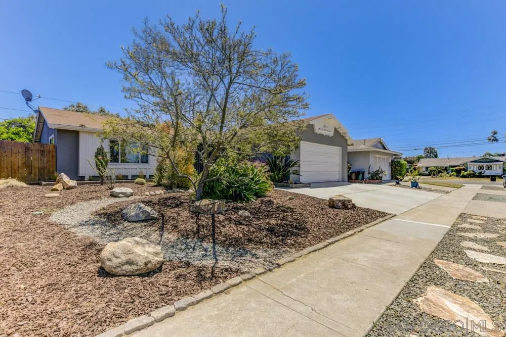 4925 Rebel Road San Diego, CA 92117 - Photo 25 of 25 a view of a house with a snow on the yard