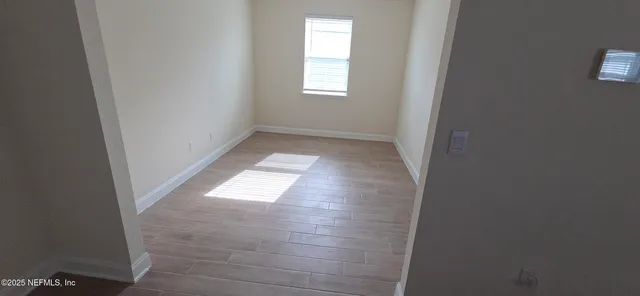 a kitchen with stainless steel appliances a refrigerator microwave and sink