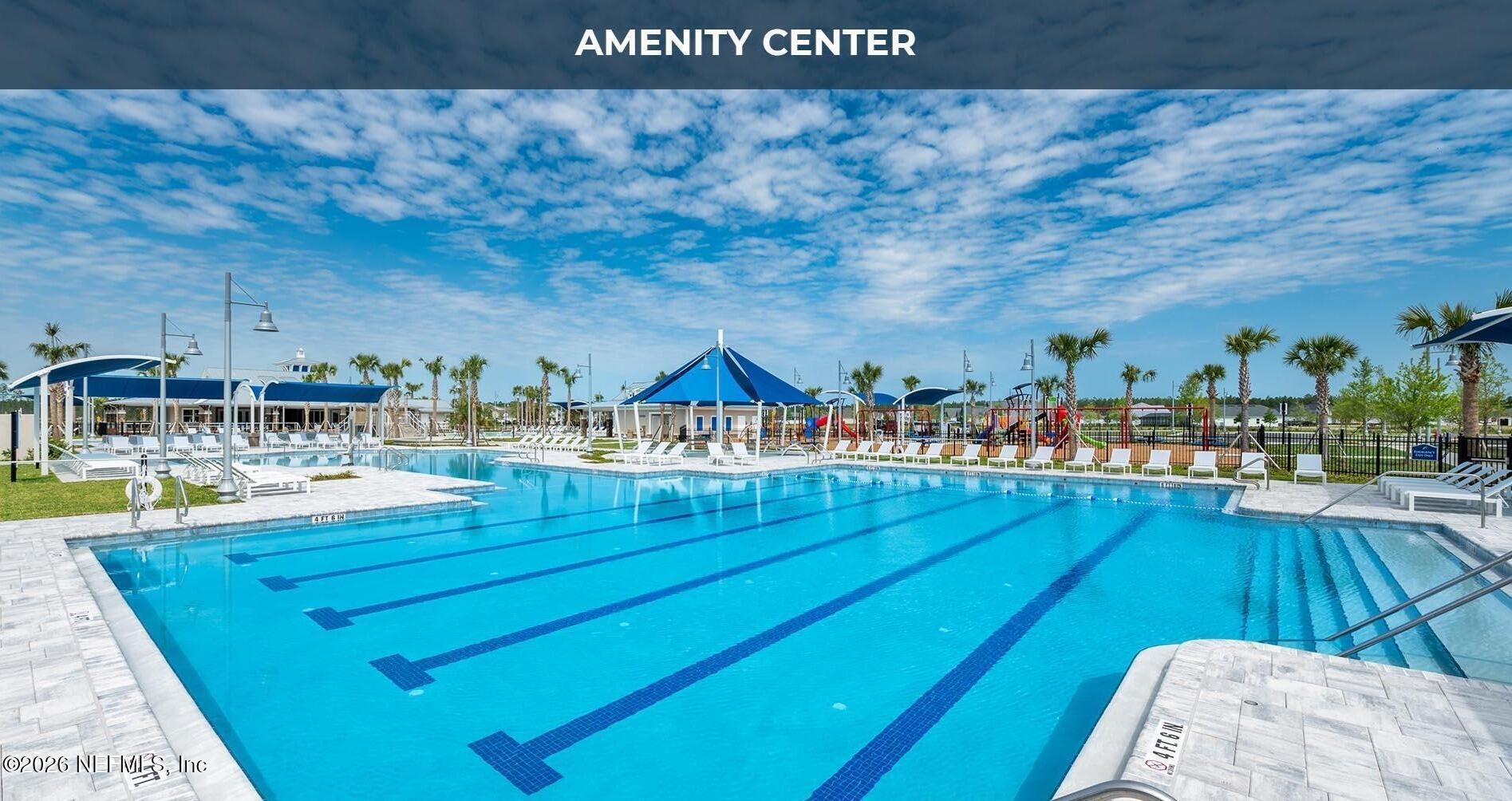 228 Thistleton Way Street St. Augustine, FL 32092 - Photo 22 of 25 a view of a swimming pool with outdoor seating