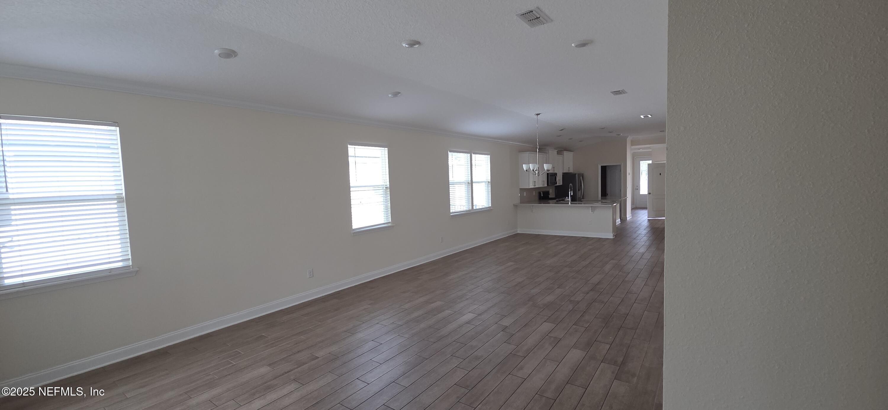 228 Thistleton Way Street St. Augustine, FL 32092 - Photo 8 of 15 a view of livingroom and window