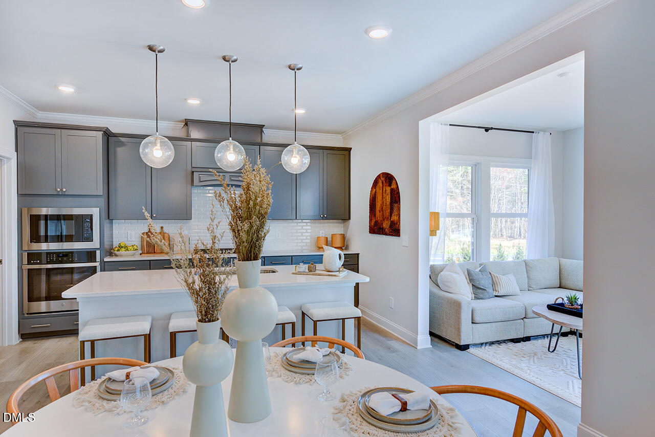 1112 Sun Spgs Road Wake Forest, NC 27587 - Photo 13 of 44 a very nice looking dining room with furniture