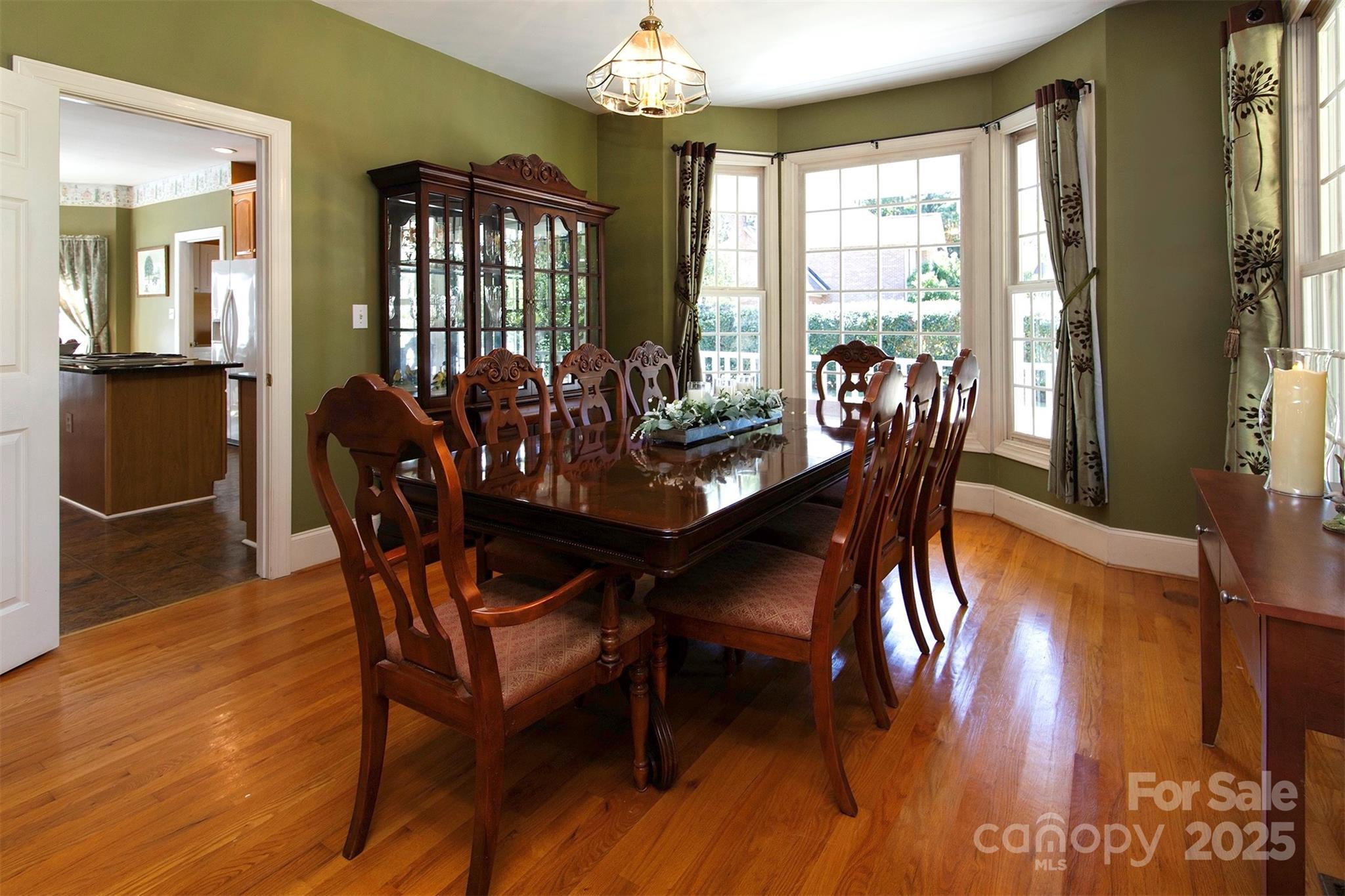 1595 High Ridge Drive Stanley, NC 28164 - Photo 15 of 32 a view of a dining room with furniture window and wooden floor