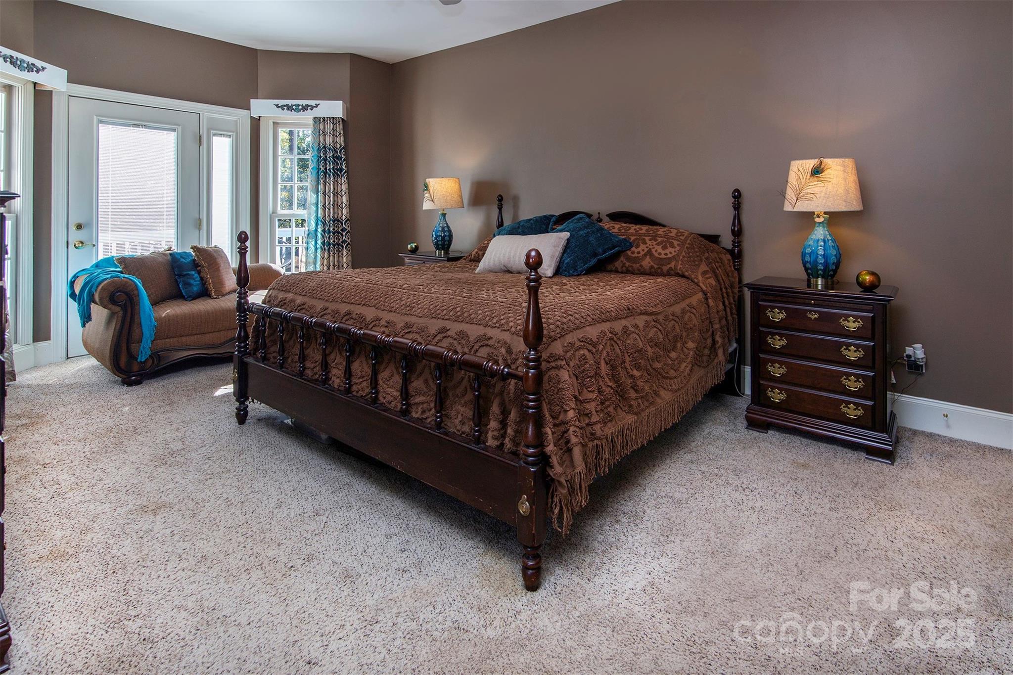 1595 High Ridge Drive Stanley, NC 28164 - Photo 18 of 32 a bedroom with a bed and a couch next to a window
